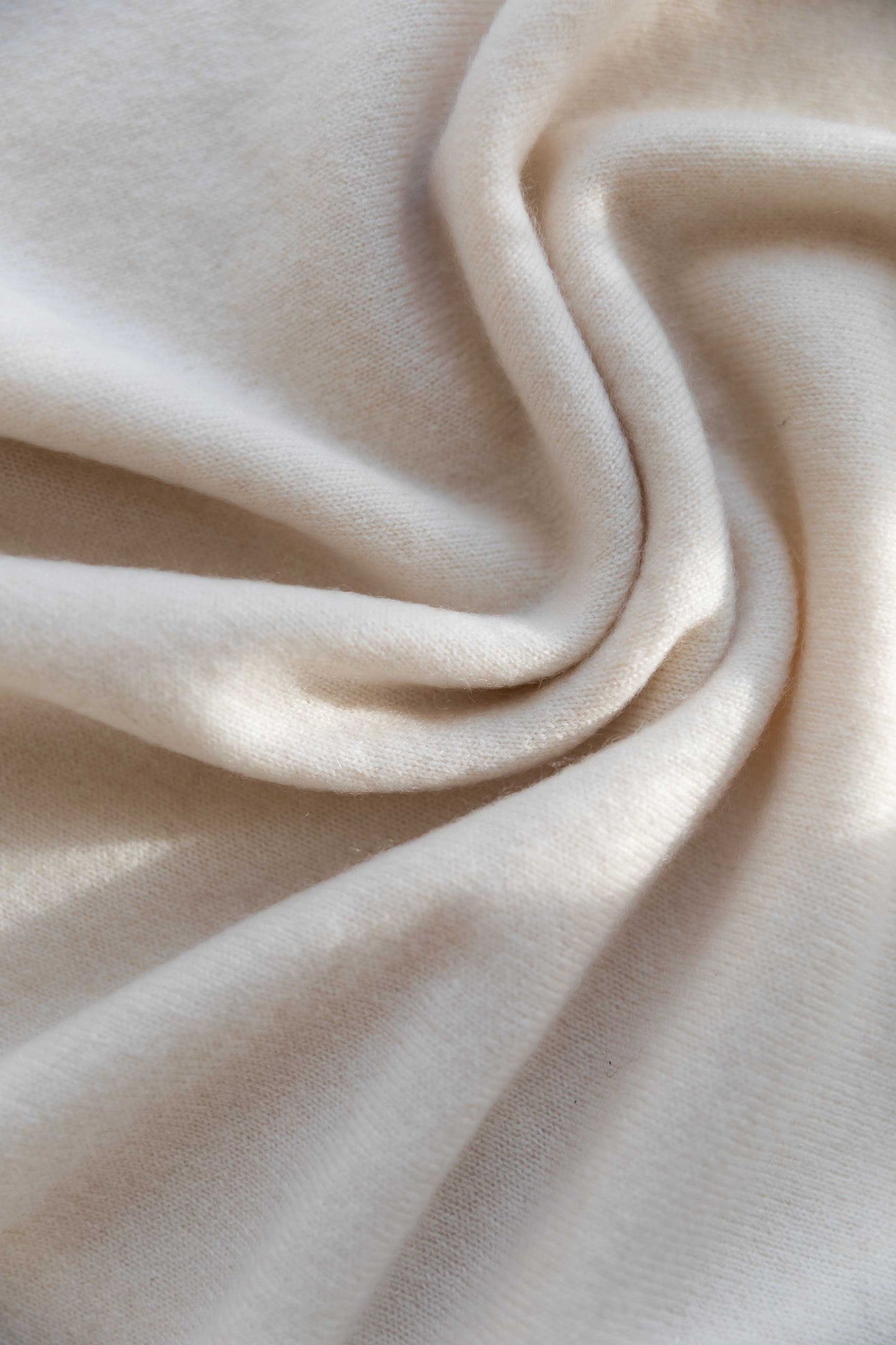 A texture of 100% Mongolian cashmere in natural white