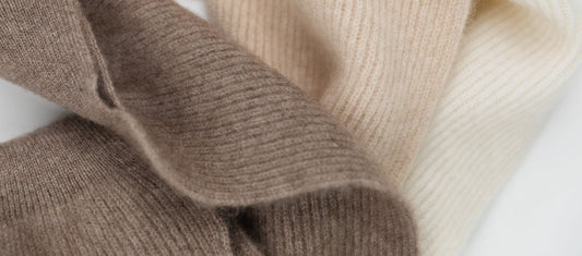 Texture of cashmere in natural colours: brown, beige and white