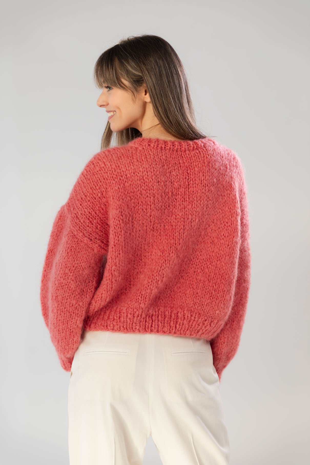 Raspberry pink mohair and organic wool sweater, oversized fit and a boxy shape.