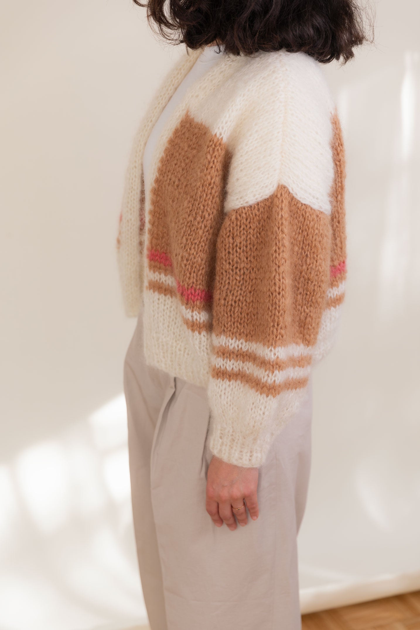 Mohair-Bio Wool Cardigan with camel and ivory white stripes.