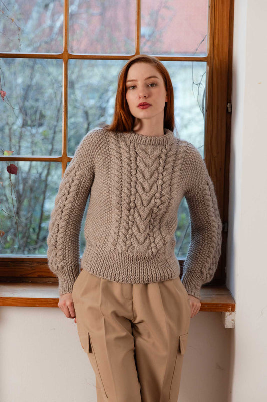 woman wearing a handmade wool bubble knit sweater