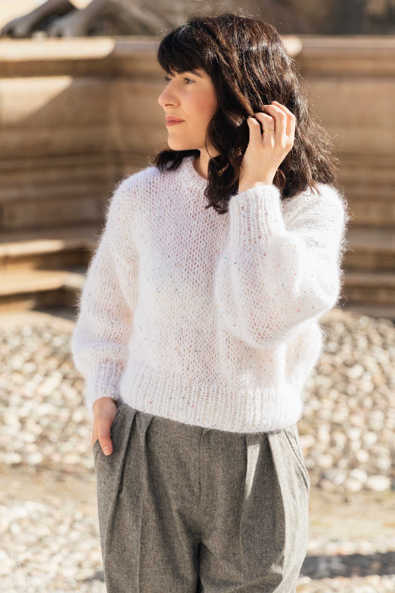 White mohair sweater embellished with delicate flower sequins. Handmade in Austria